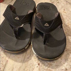 Reef flip flops with camo print on the sides